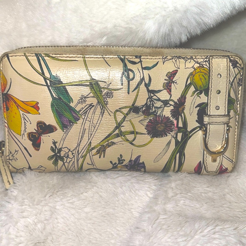 Authentic Gucci floral zip around wallet see pictures for more details